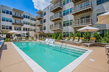 Outdoor pool with steps, pool-side seating and sundeck